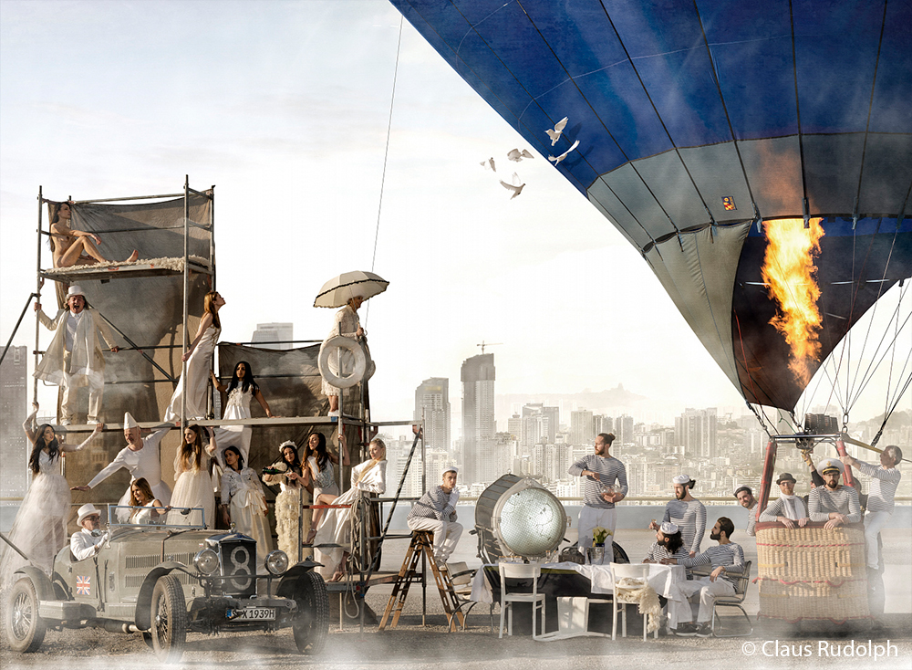 Br24 Photographers & Studios: Photo with several models, scaffolding, car, hot air balloon and more in front of a city skyline in the background after processing