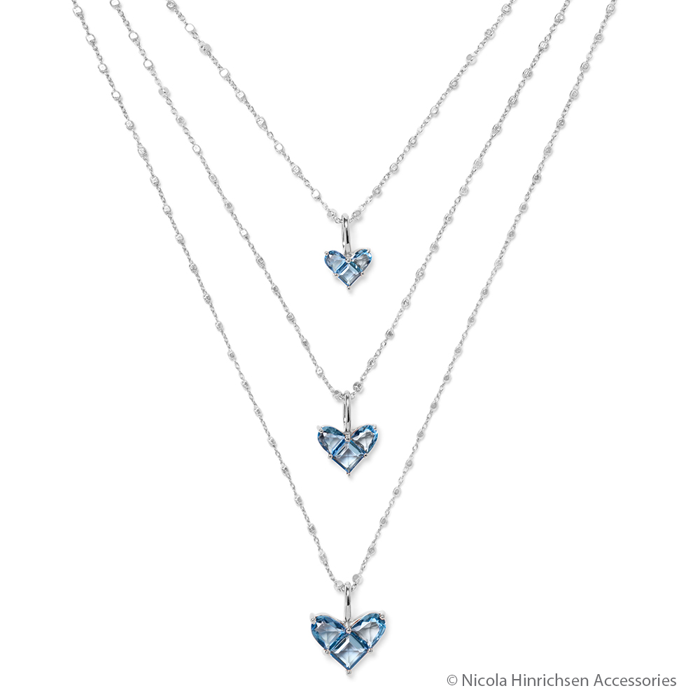 Br24 Colour Correction, jewellery: three silver necklaces with blue heart pendant