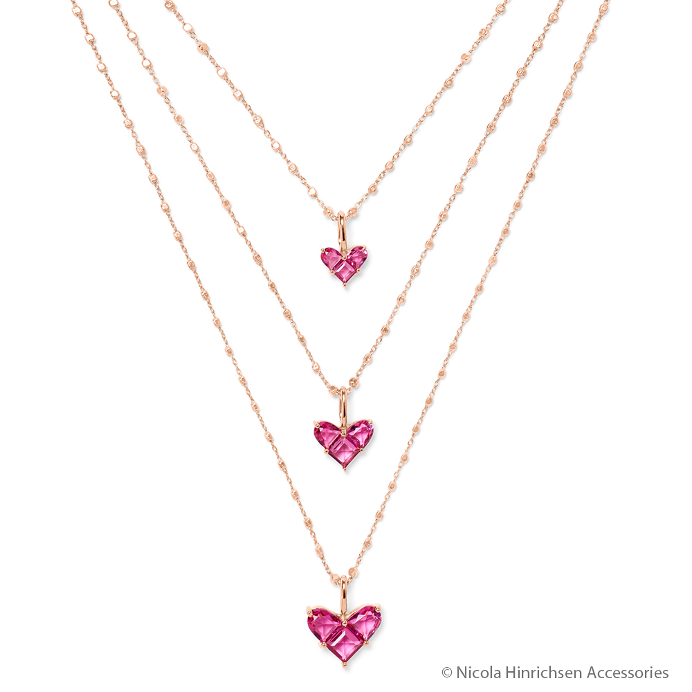 Br24 Colour Correction, jewellery: three gold necklaces with pink heart pendant